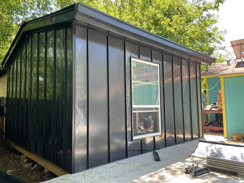 Black standing seam metal wall panels for Roof Inspection in Crest Hill